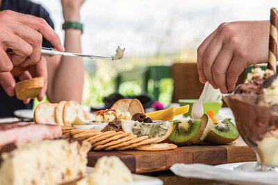 People enjoying great food on a table in Atherton Tablelands Far North Queensland